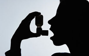 Asthma is a disease that causes severe attacks of wheezing and coughing.